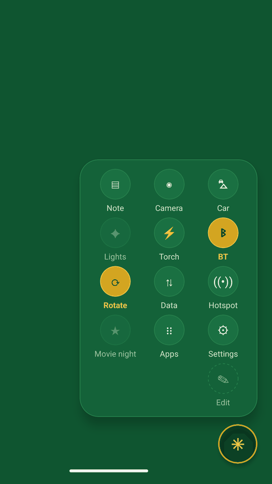 The deck panel open over the home screen: a grid of round buttons — Note, Camera, Car, Lights, Torch, Bluetooth, Rotate, Data, Hotspot, Movie night, Apps, Settings — and an Edit button
